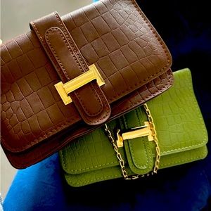 Women hand clutches in GREEN & BROWN